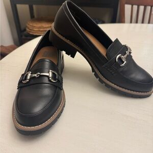 Black Leather Loafers with Silver Detailing